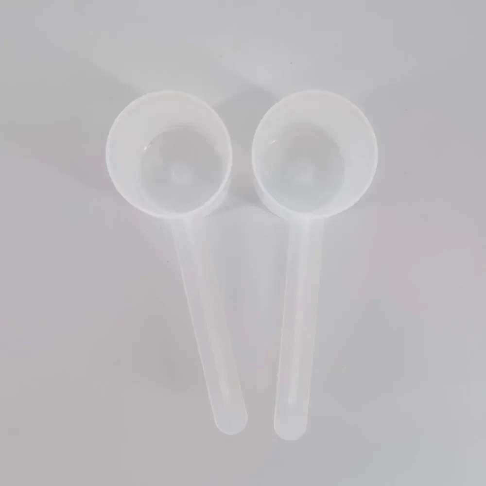 Two National Measures Transluscent Plastic Long Handle Measuring Scoops - 60 CC